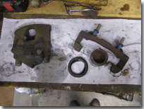 Front caliper dismantled - Click for larger image