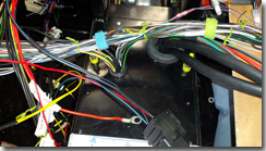 Original wiring routing through the tunnel cover - Click for larger image