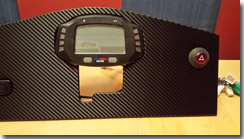 Covering the dashboard with the carbon fibre vinyl wrap - Click for larger image
