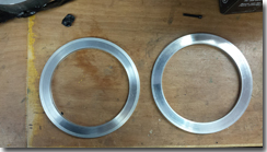 Turned down aluminium spacer rings to mount the LED headlamps - Click for larger image