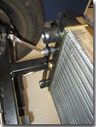 Radiator mounted to chassis on rubber mounts - Click for larger image